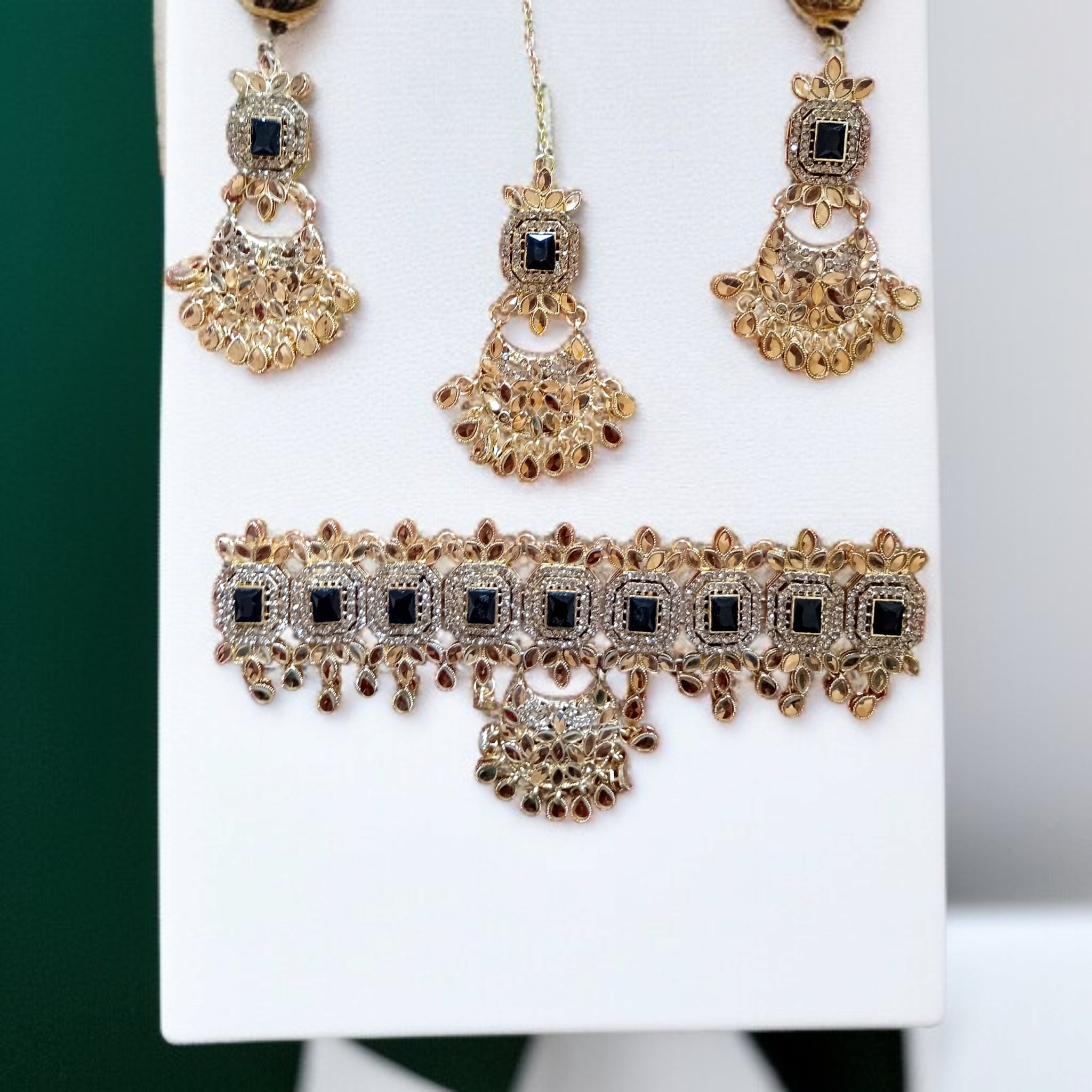 Buy Black and Golden colour jewellery set with necklace , earrings and tikka at best price in Pakistan
